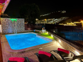 Villa Puerto Rico in front of the shopping center with private heated saltwater pool with jacuzzi & arcade games & t able foot ball
